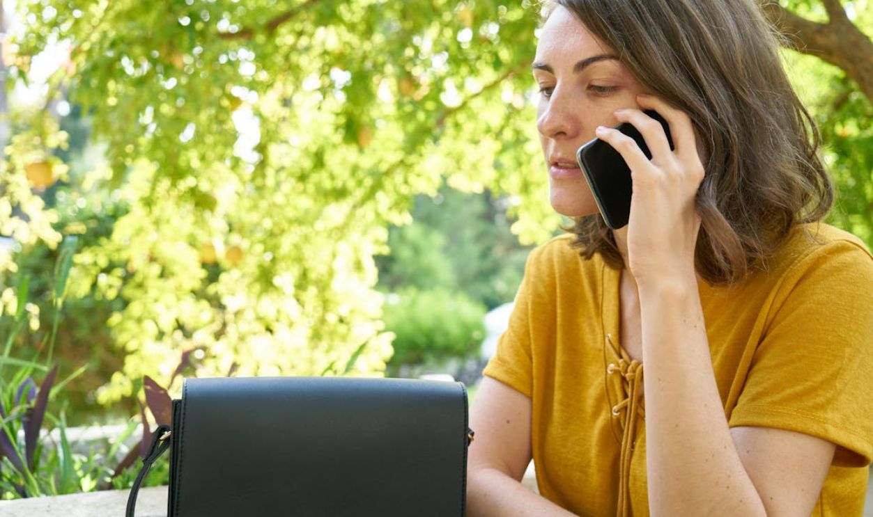 Woman Using Black Android Smartphone