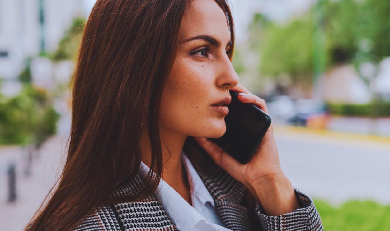 Close-Up View of Businesswoman Talking on Phone