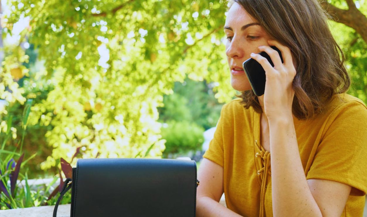 Woman Using Black Android Smartphone