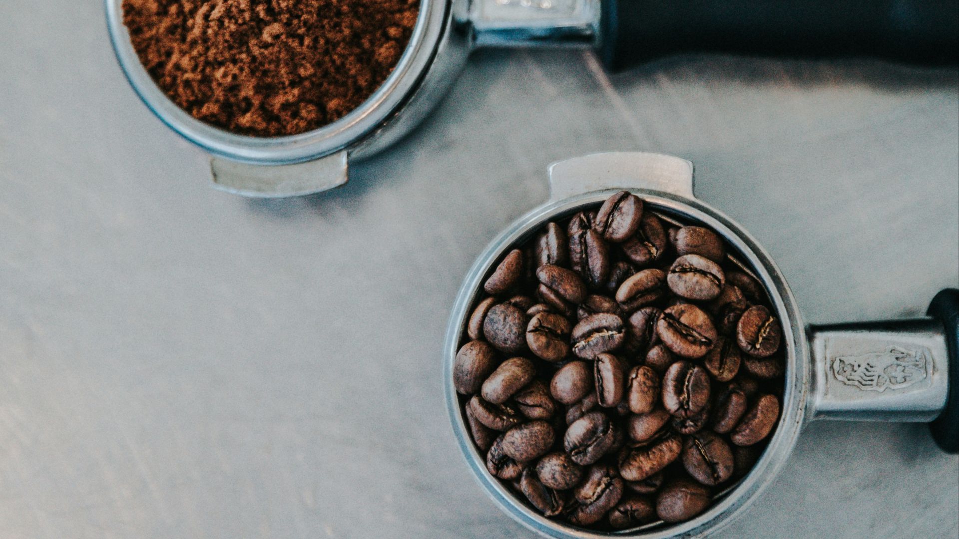 flat lay photography of coffee latte, ground coffee, and coffee beans