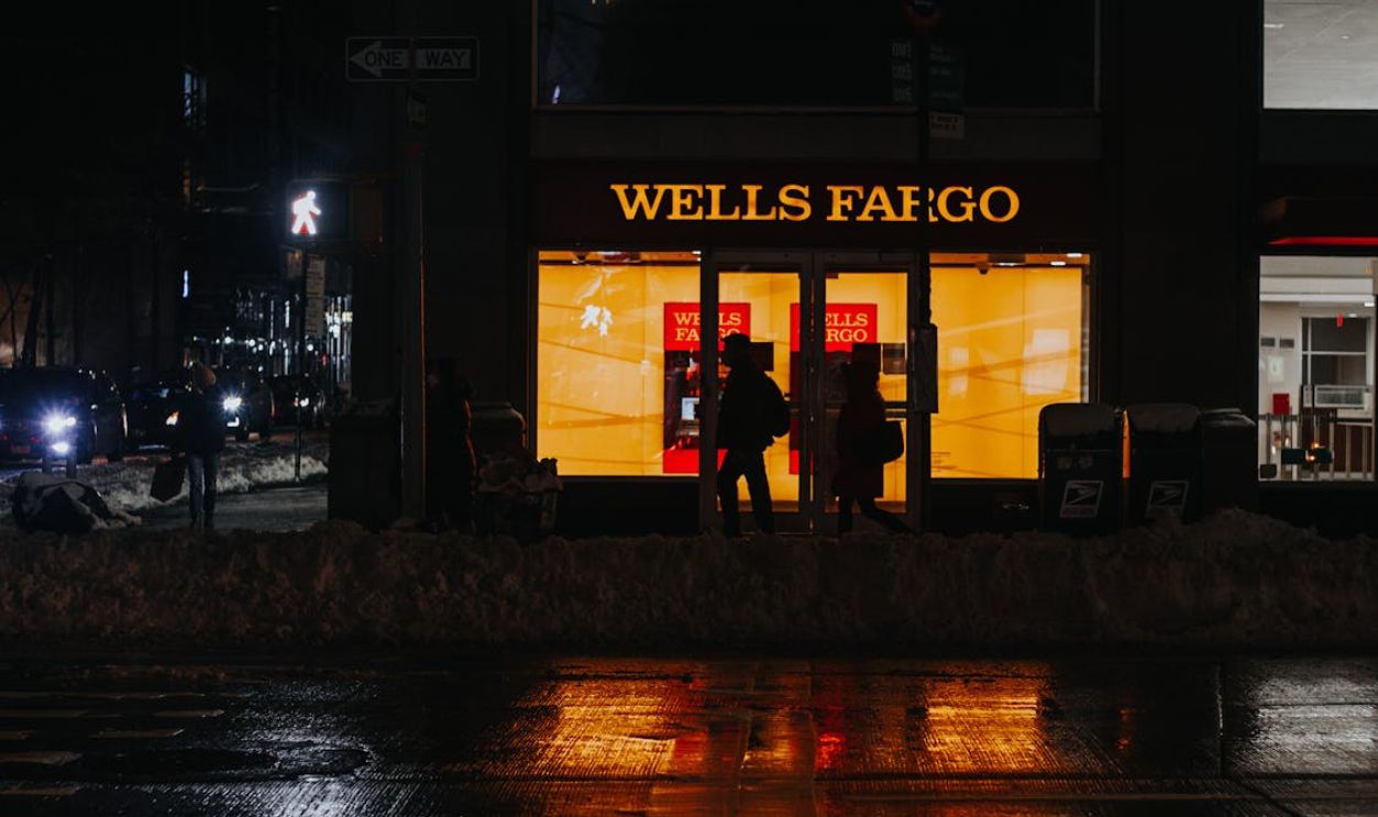 Modern busy city street in dark evening