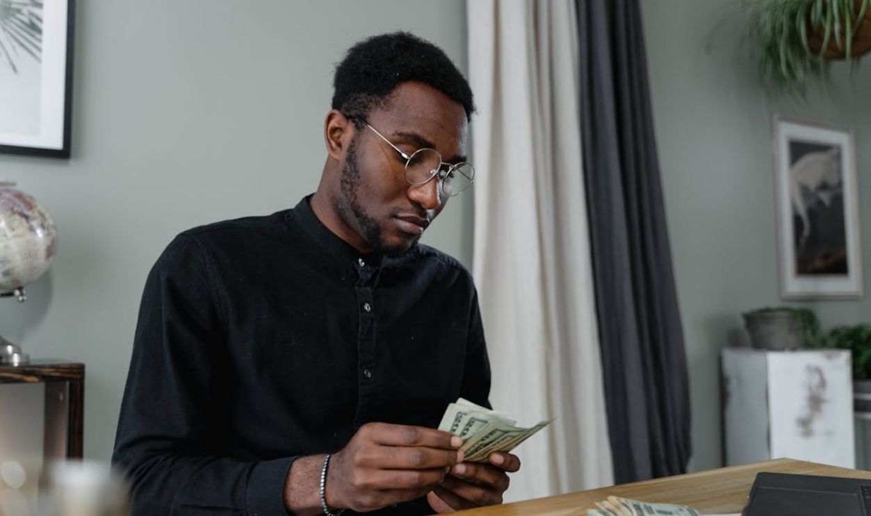 A Man Counting Money