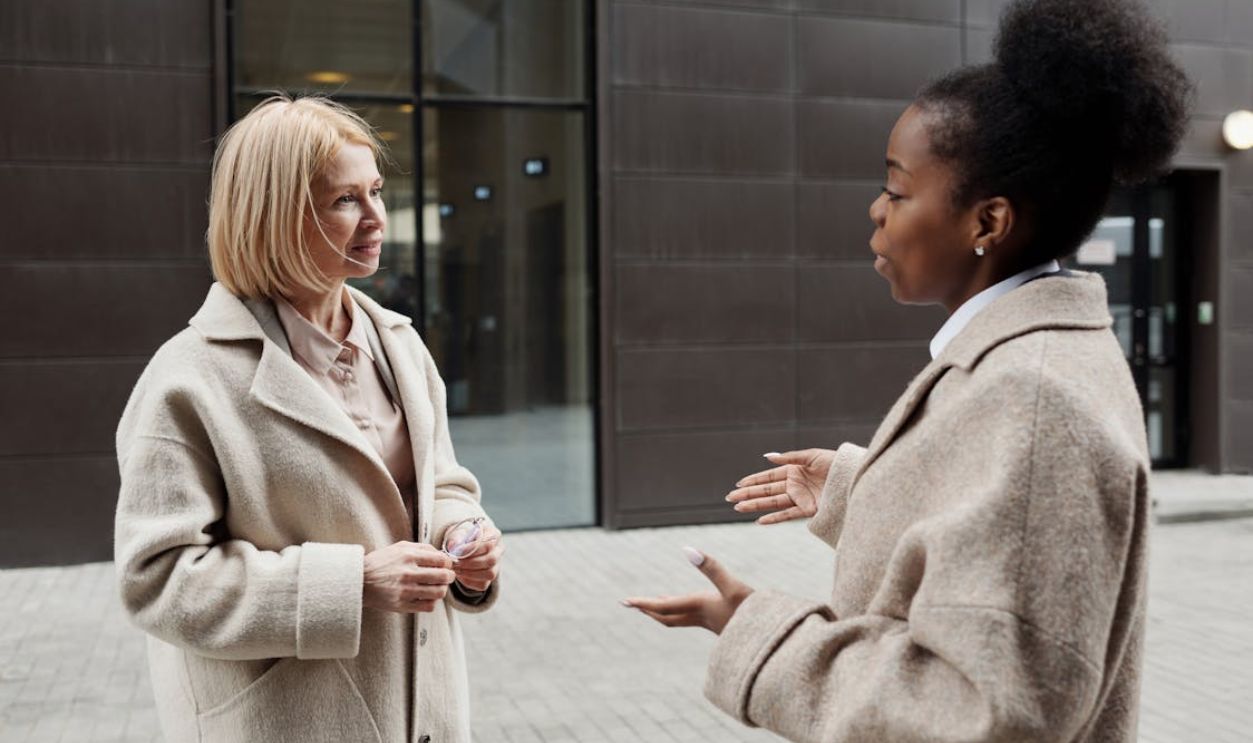 Women Talking Outside