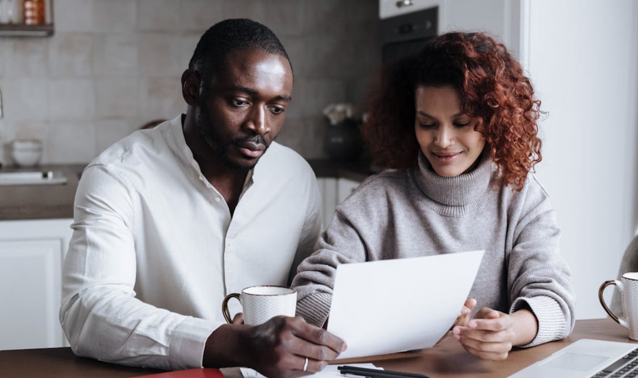 Couple Working Together at Home