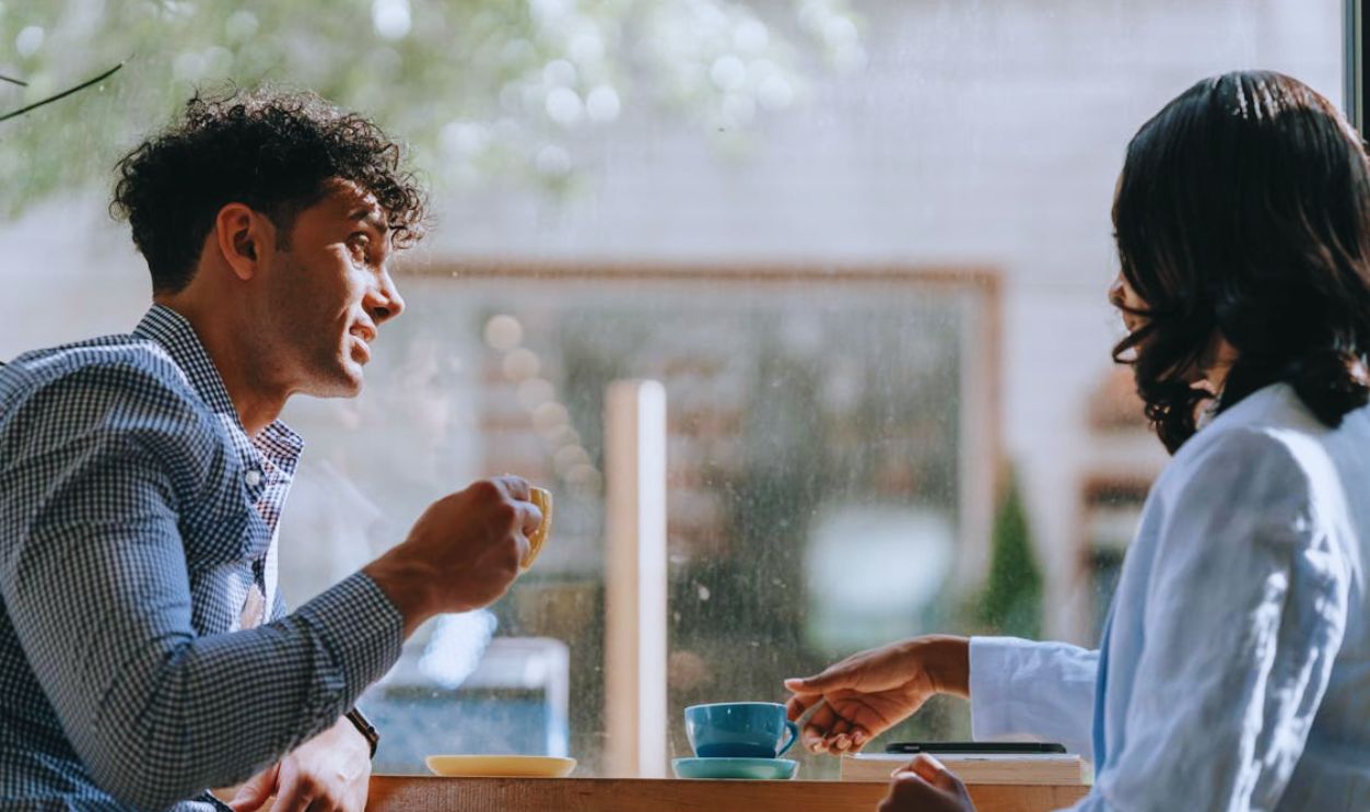 People Sitting in Cafe Drinking Coffee