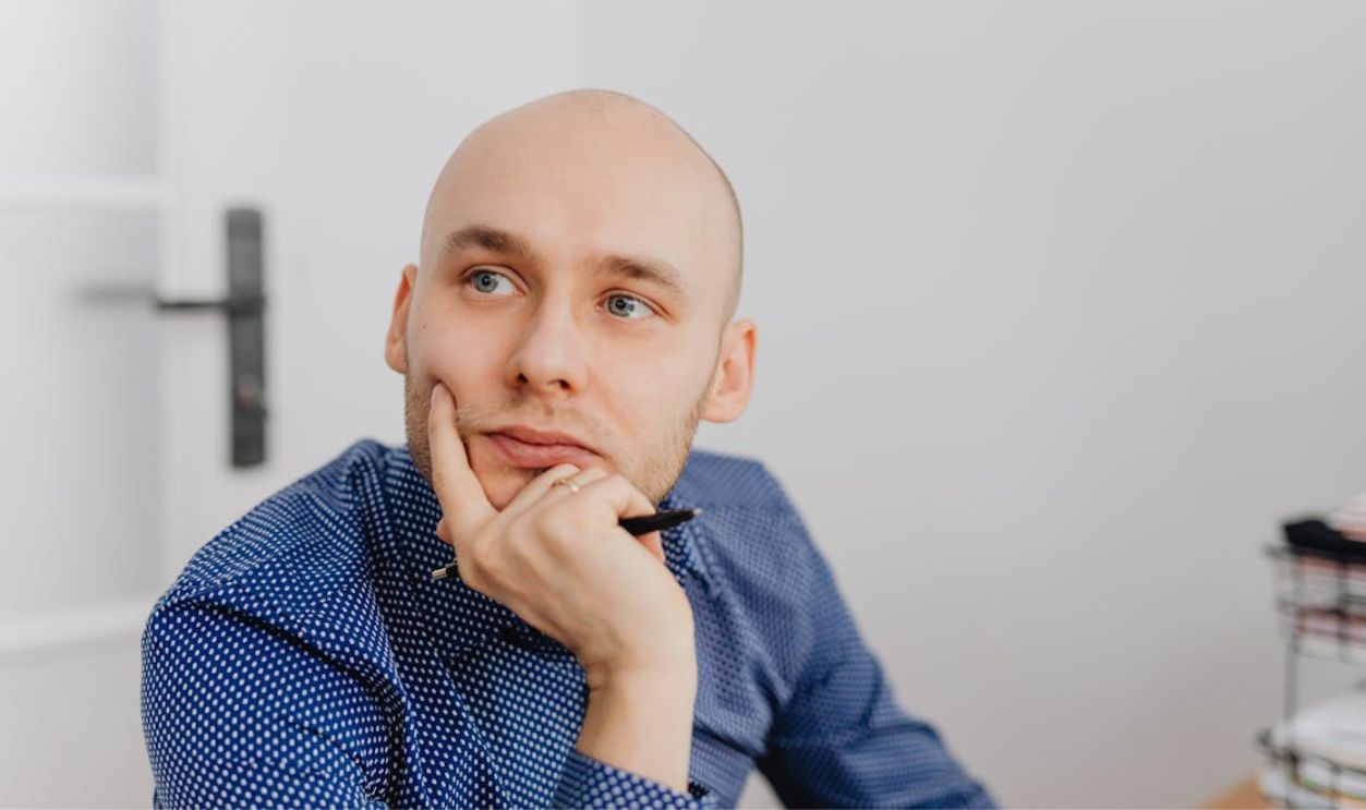 A Man Leaning on His Hand