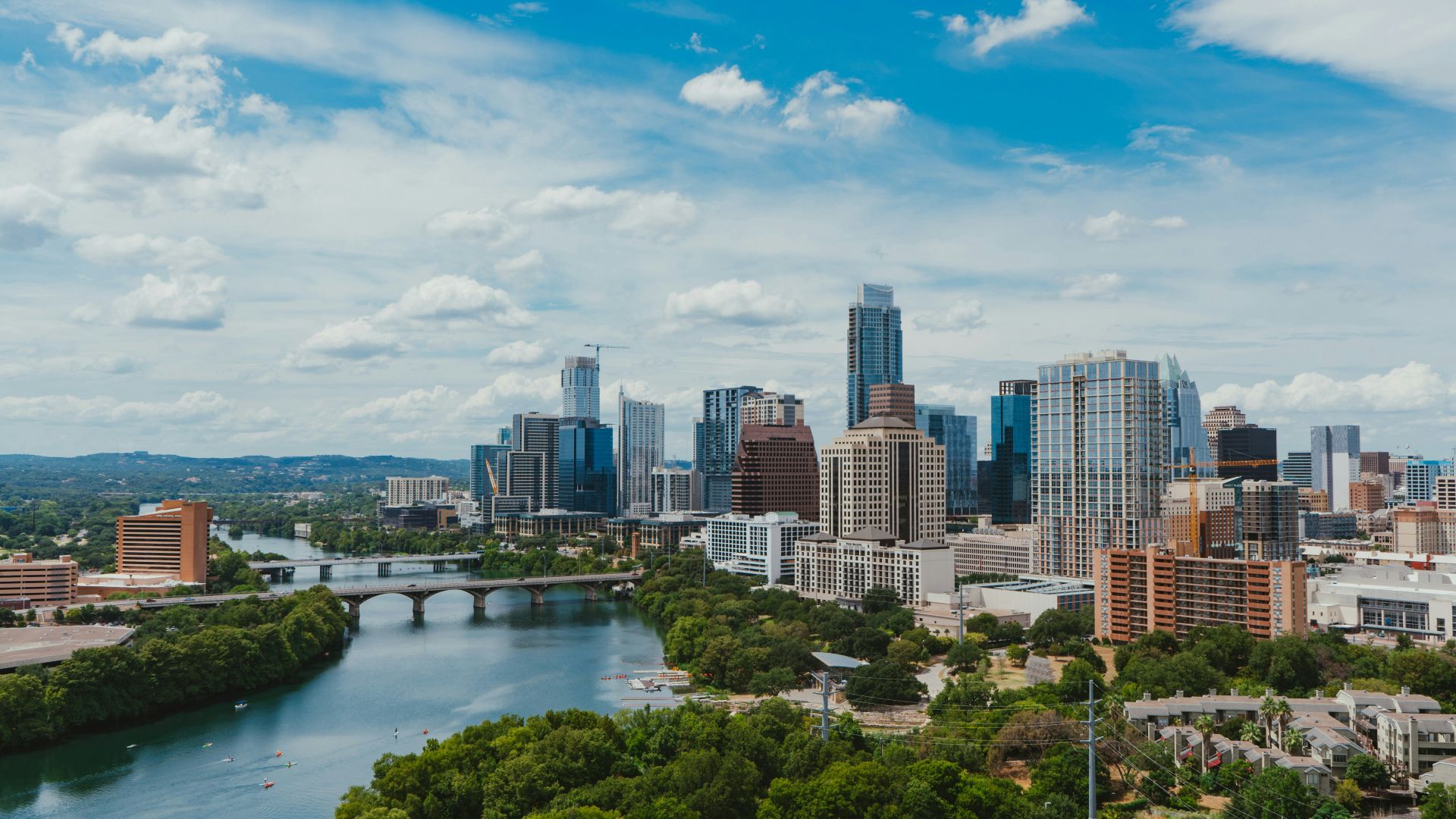 river near buildings during daytime