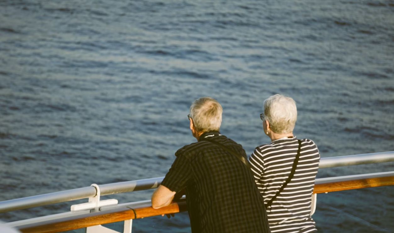 A couple of people that are on a boat
