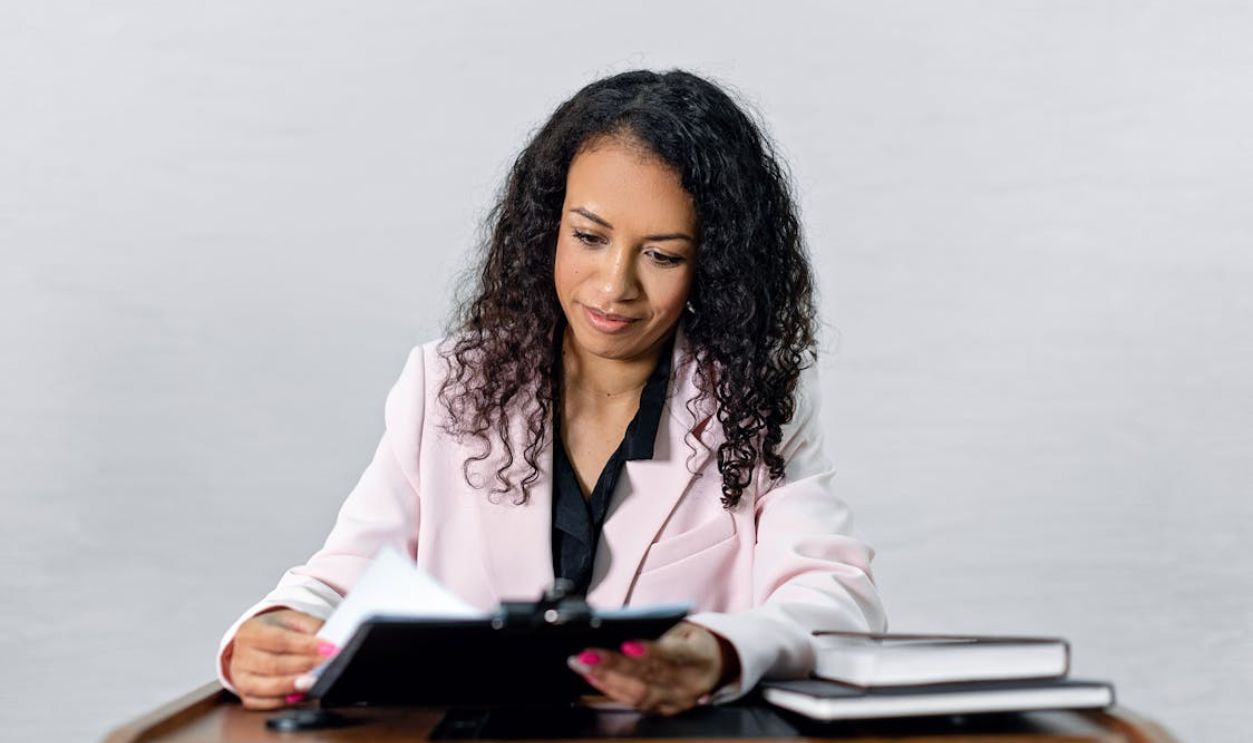 A Woman Looking the Contract