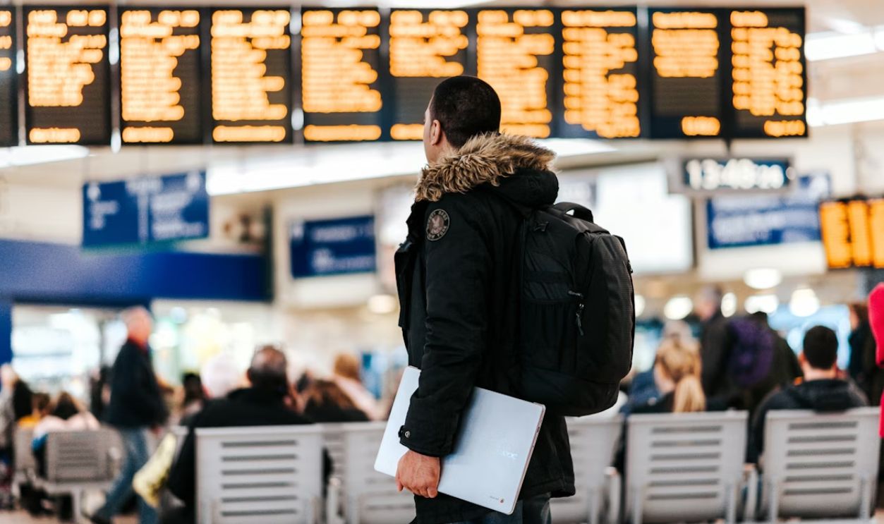 A traveler at an airport checkpoint or passport control