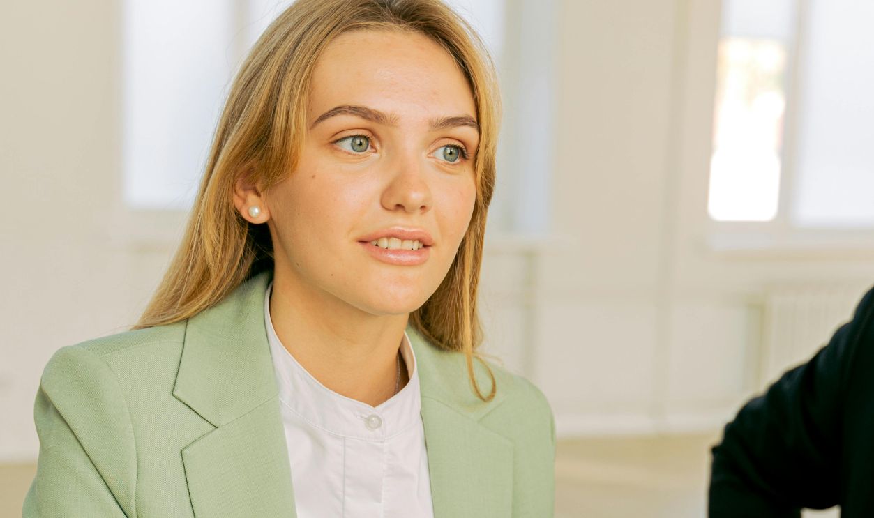 Female Professional on a Mint Green Blazer