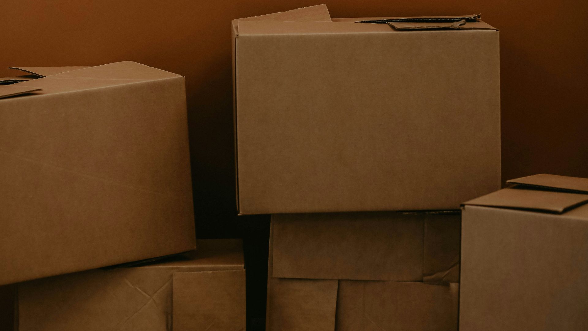 white cardboard box on brown wooden table