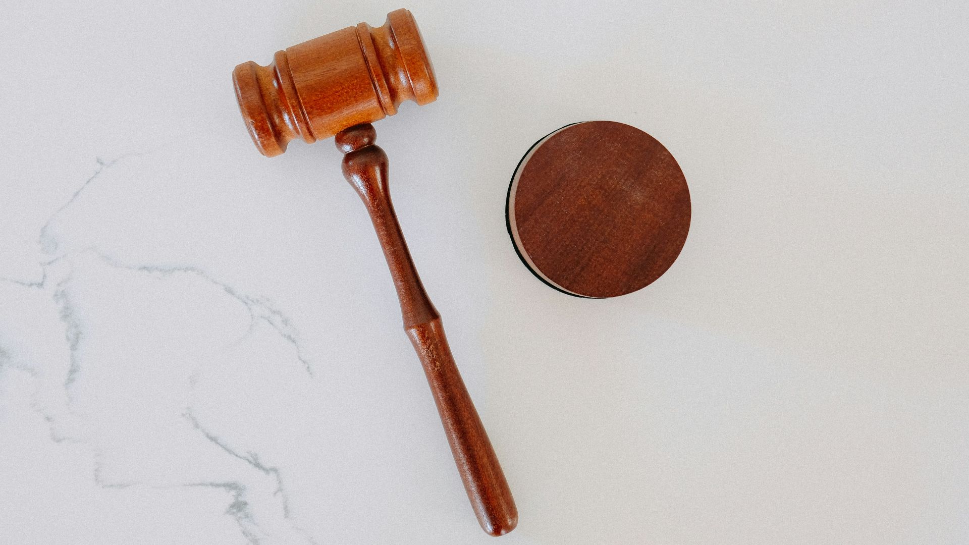 brown wooden smoking pipe on white surface