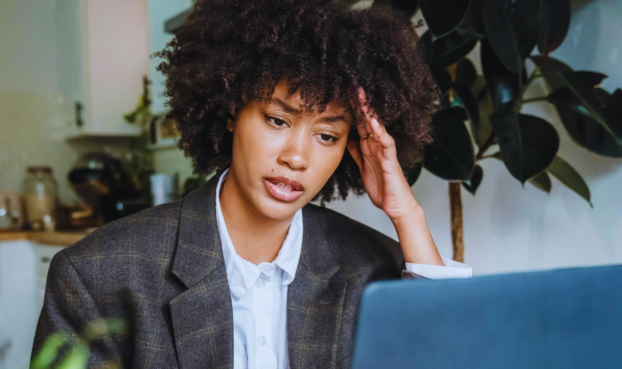 Woman Working at Home by Desk