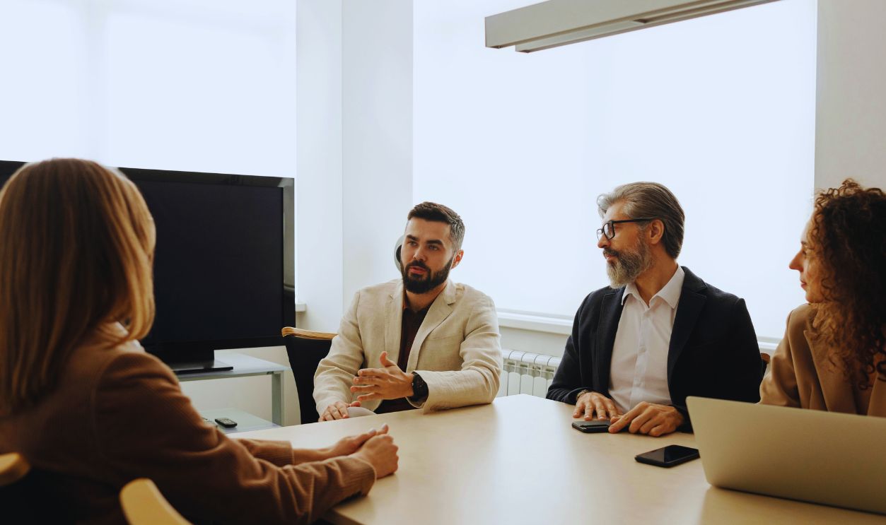 Photograph of a Group of People Talking