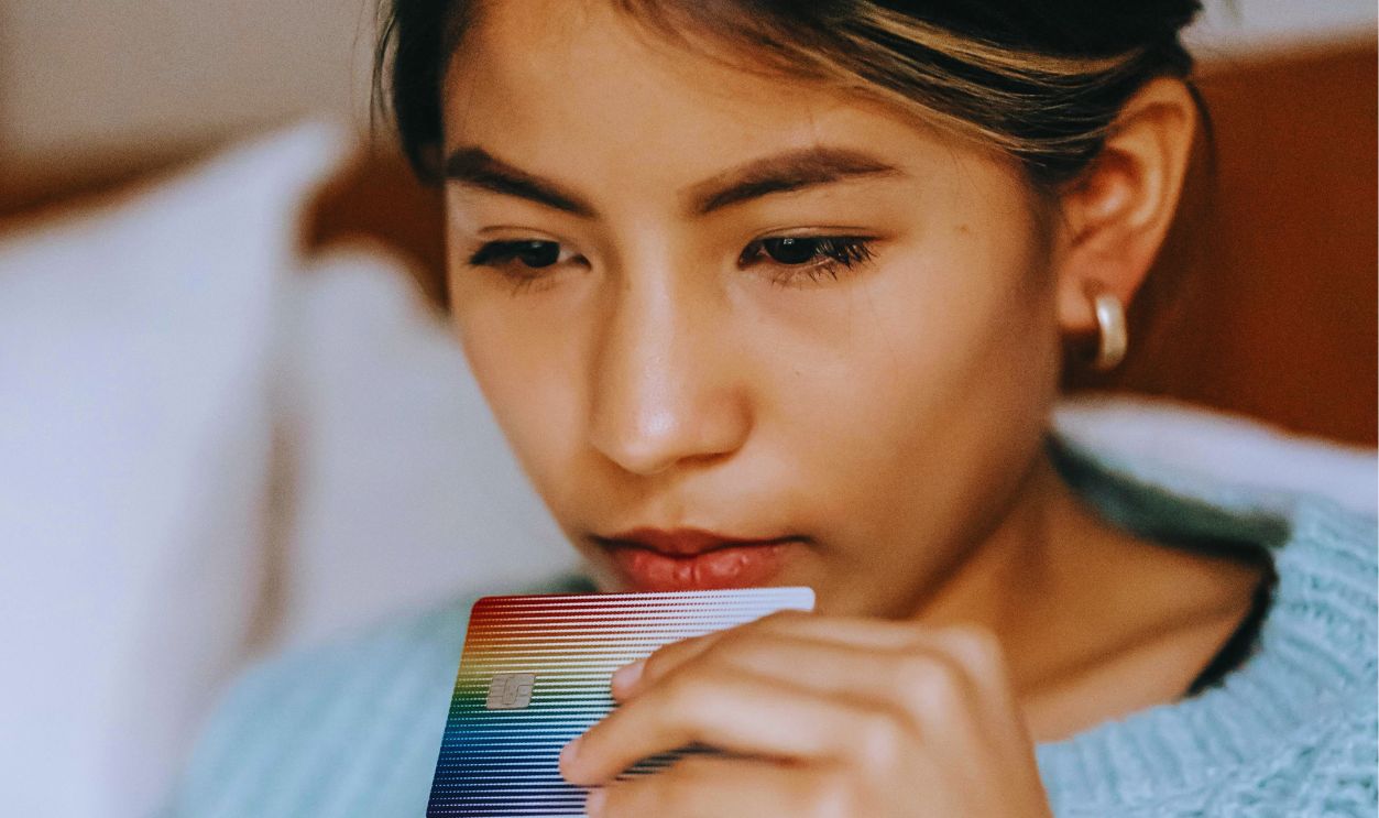 Crop focused Asian woman using laptop and making online transfer