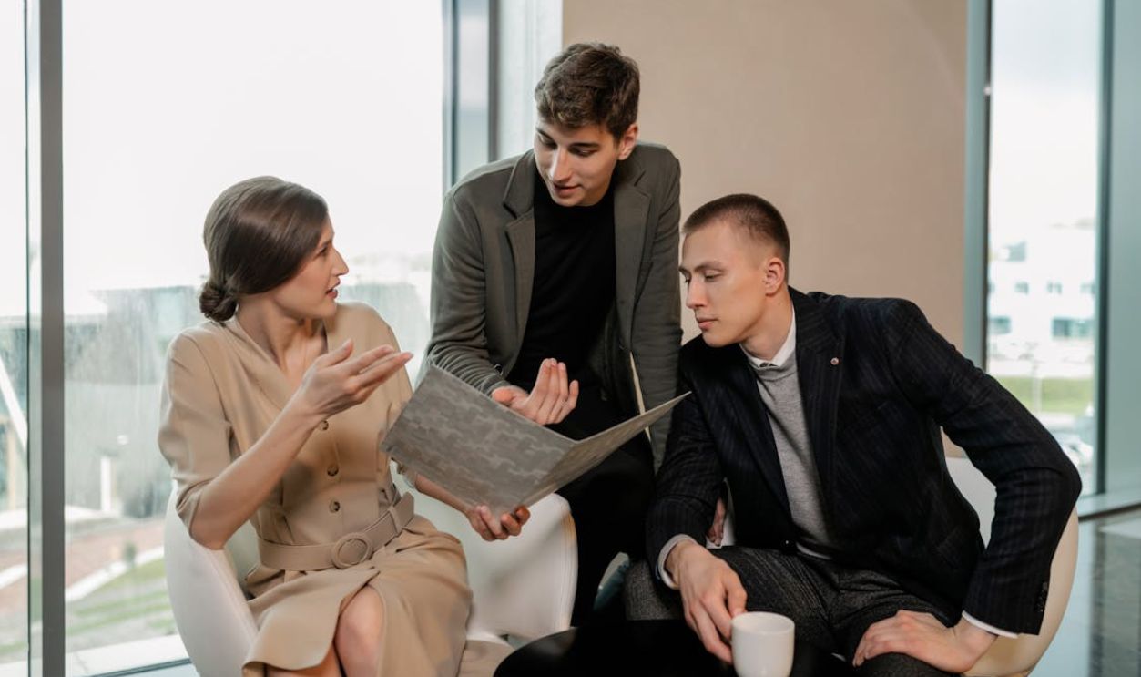 A Group of People Having Conversation Together