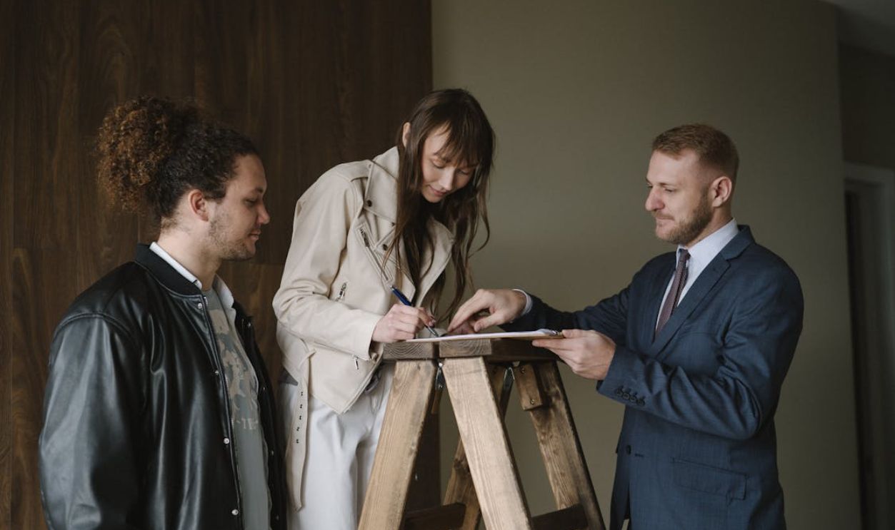 Woman Signing a Contract