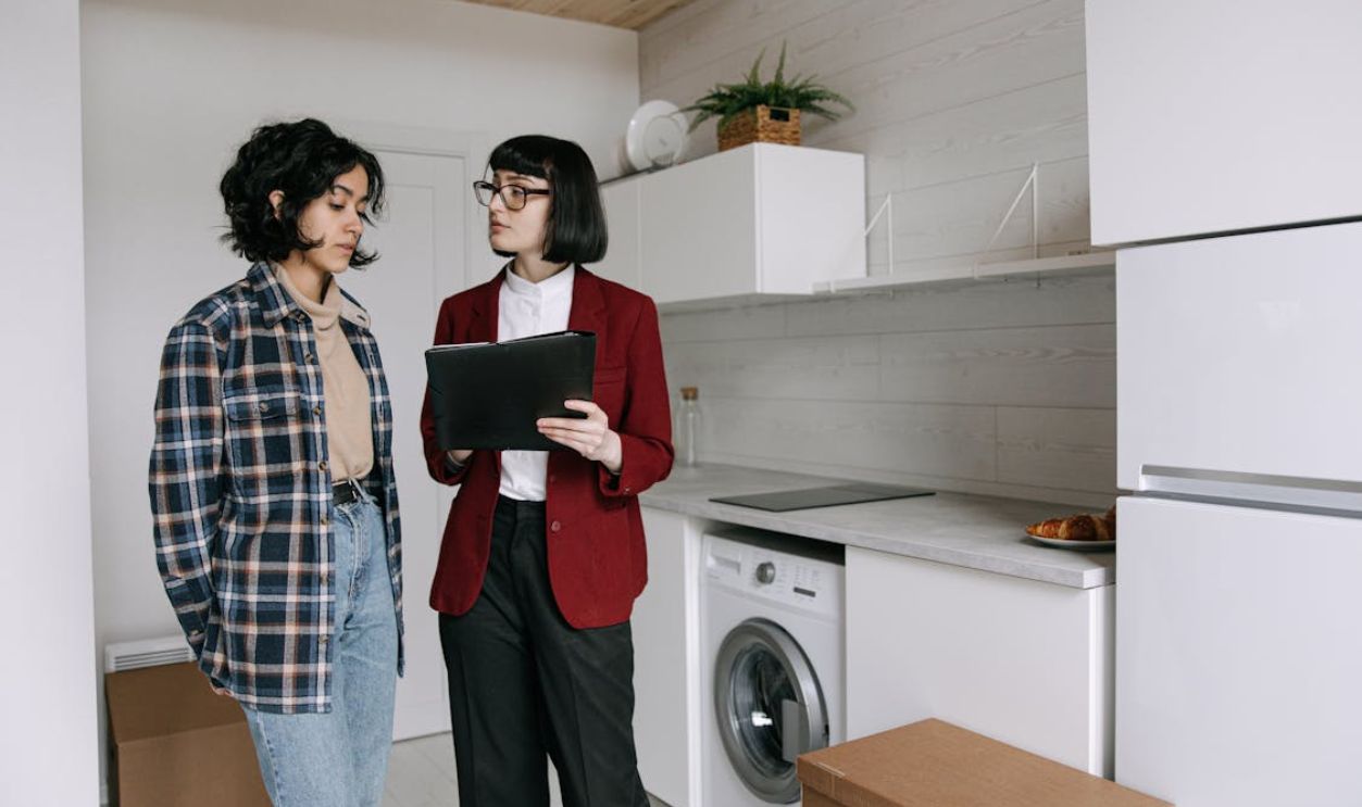 Realtor and Customer in Kitchen