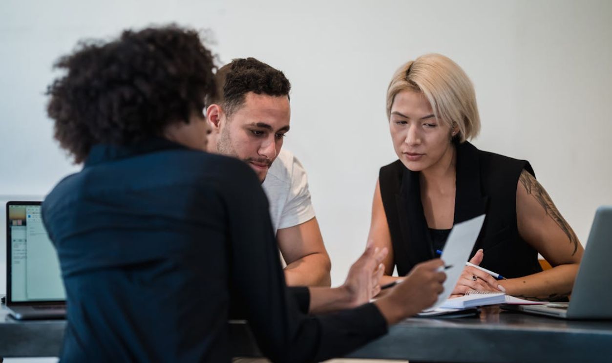 Women and Man on Business Meeting