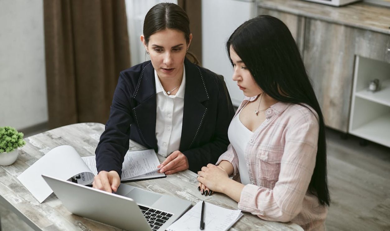 Women Looking at a Laptop Together