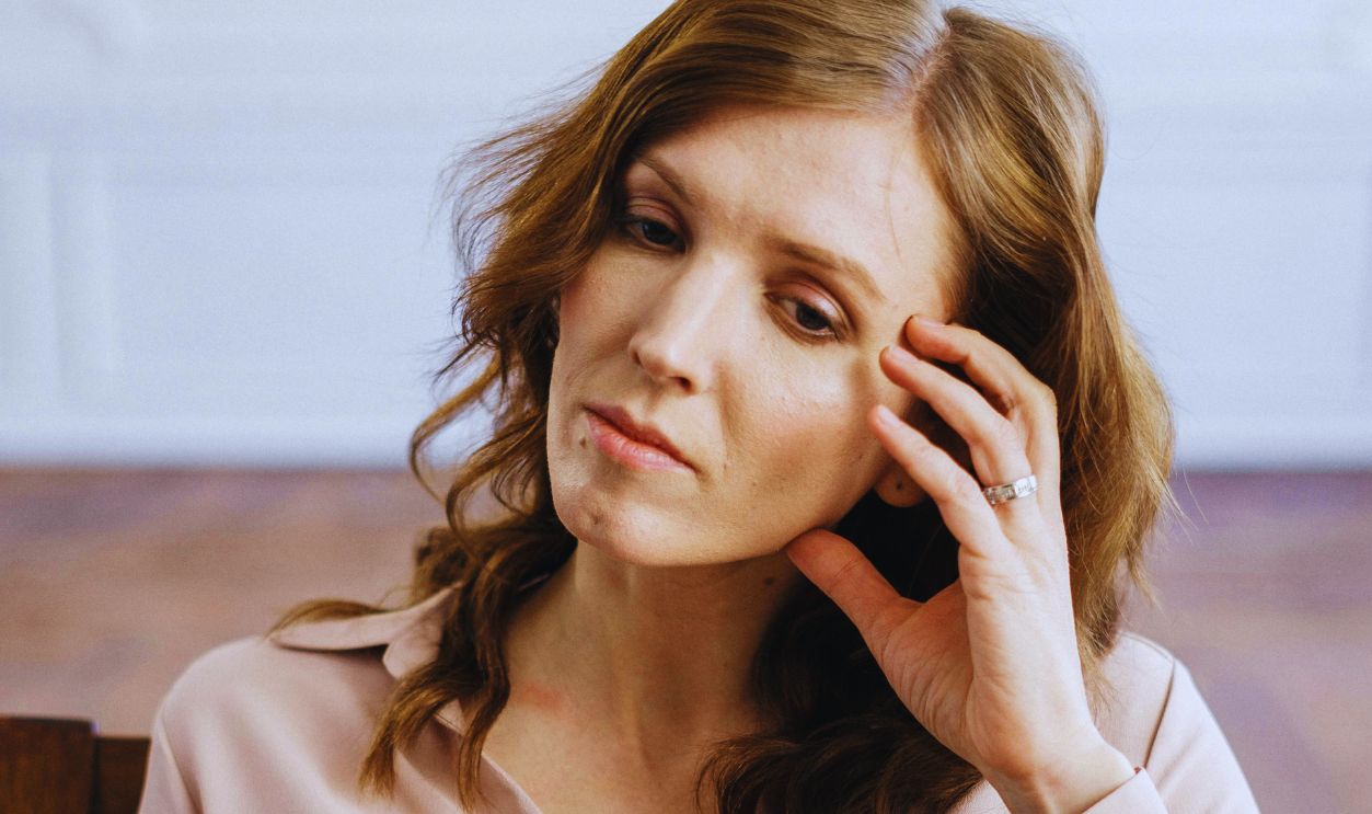 Woman in White Button Up Long Sleeve Shirt