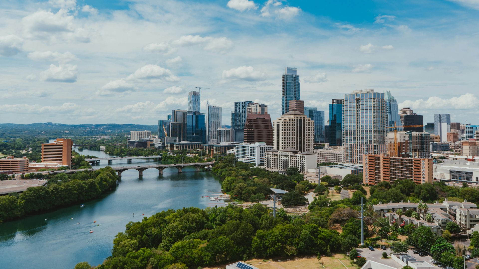 river near buildings during daytime