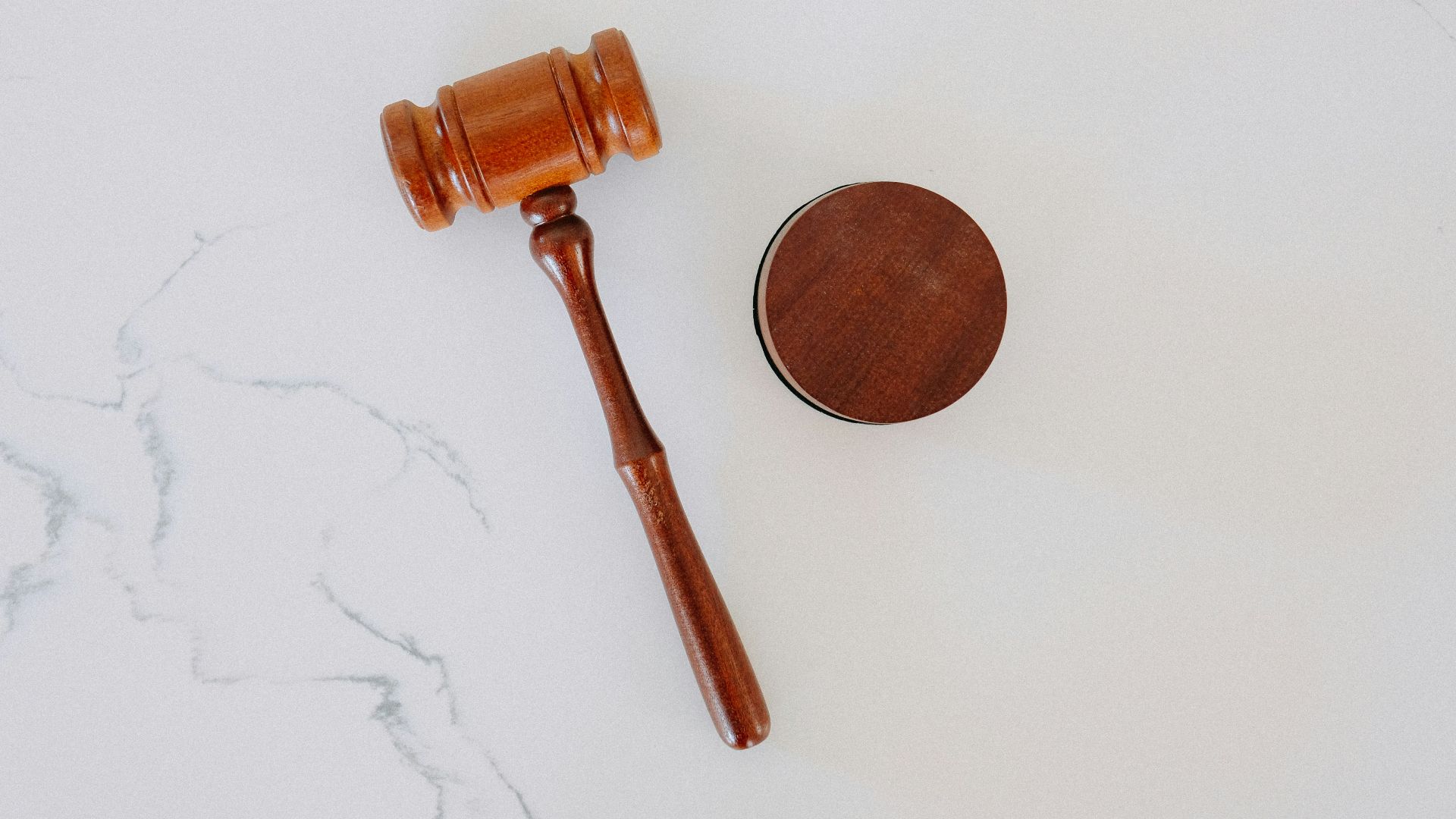 brown wooden smoking pipe on white surface