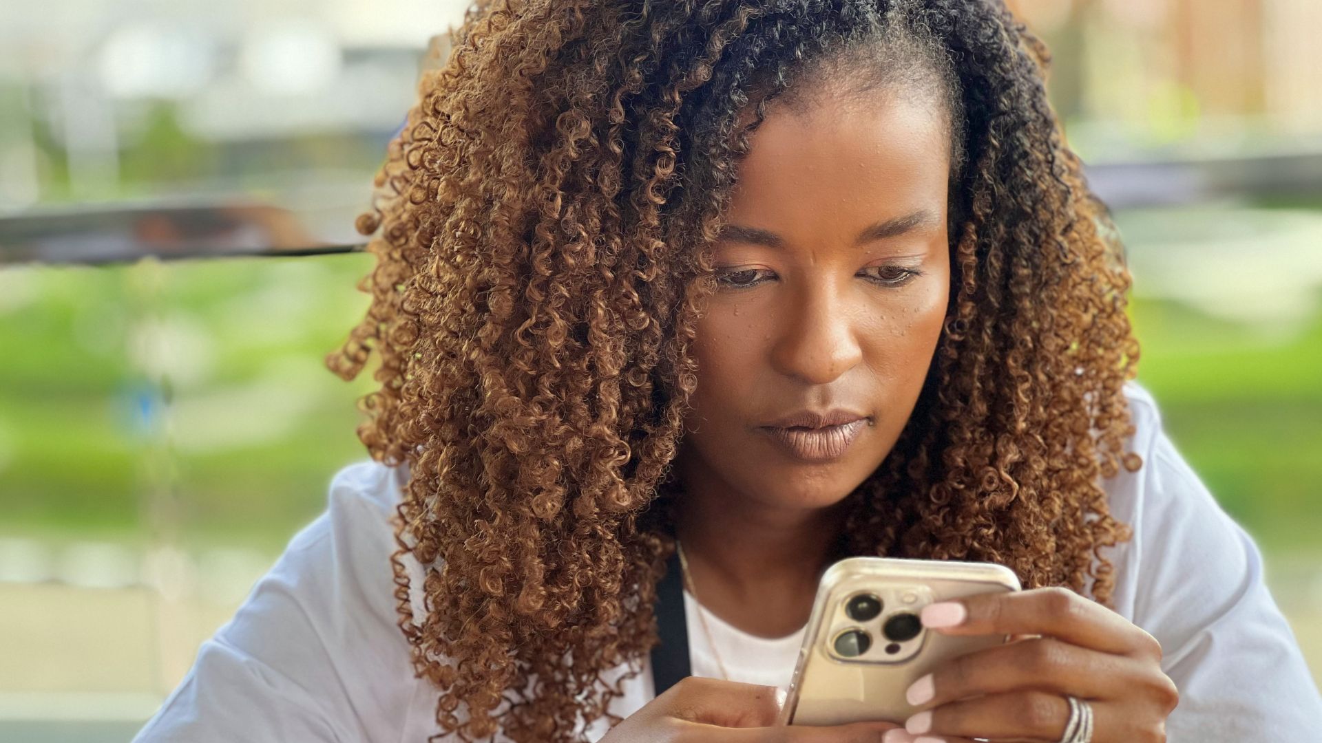 a woman holding a camera