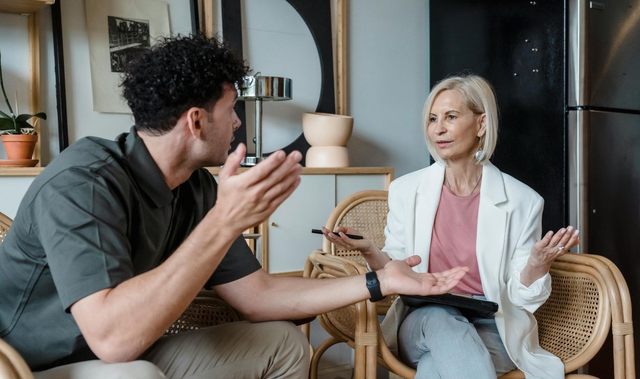 Woman and Man Discussing
