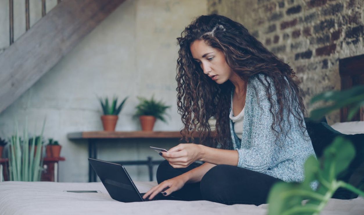 Woman Shopping Online from Home with Laptop