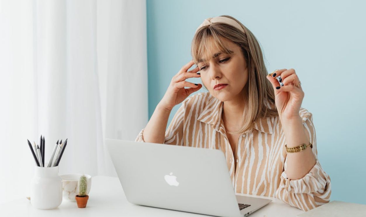 Stressed Out Woman Working on Laptop at Home