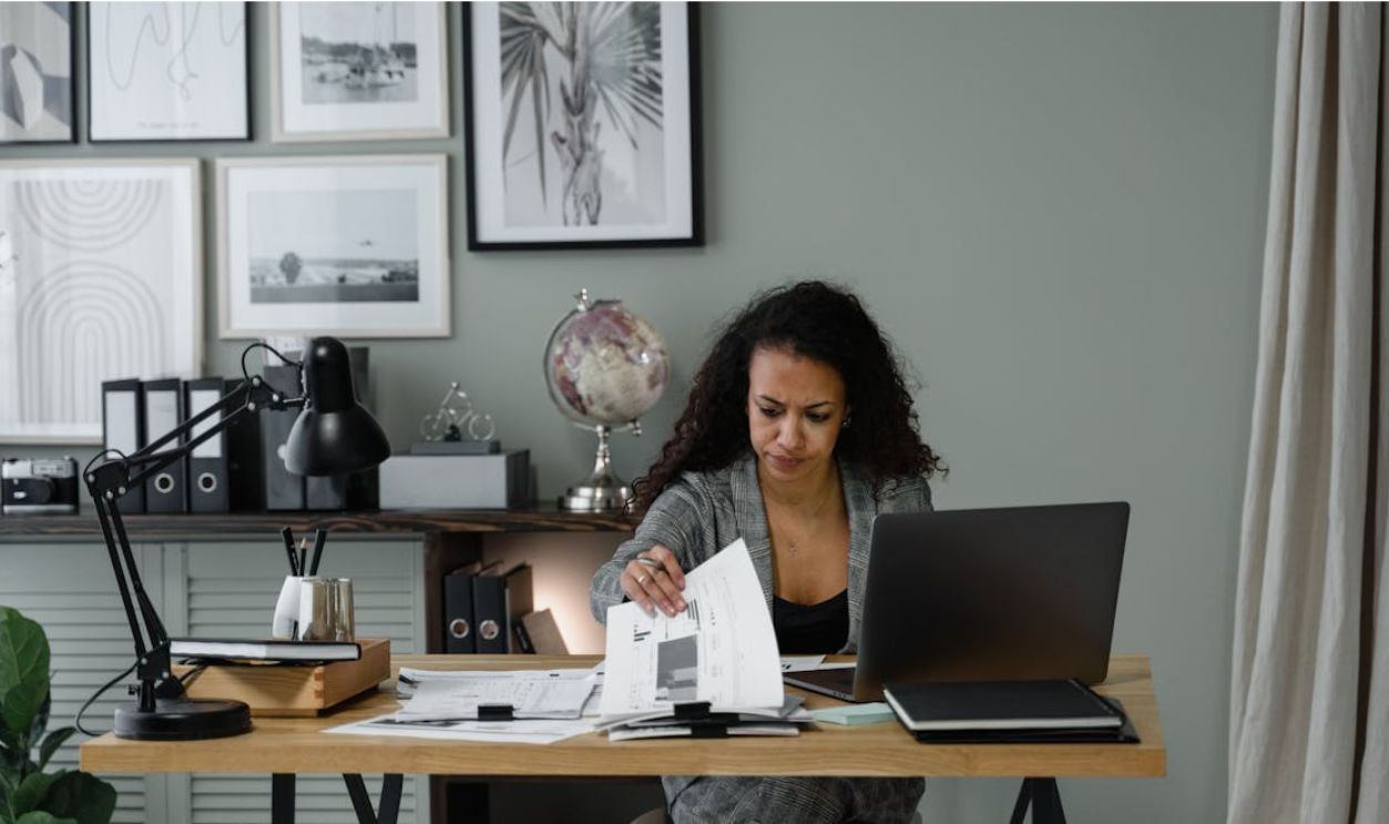 A Woman Sitting at the Table