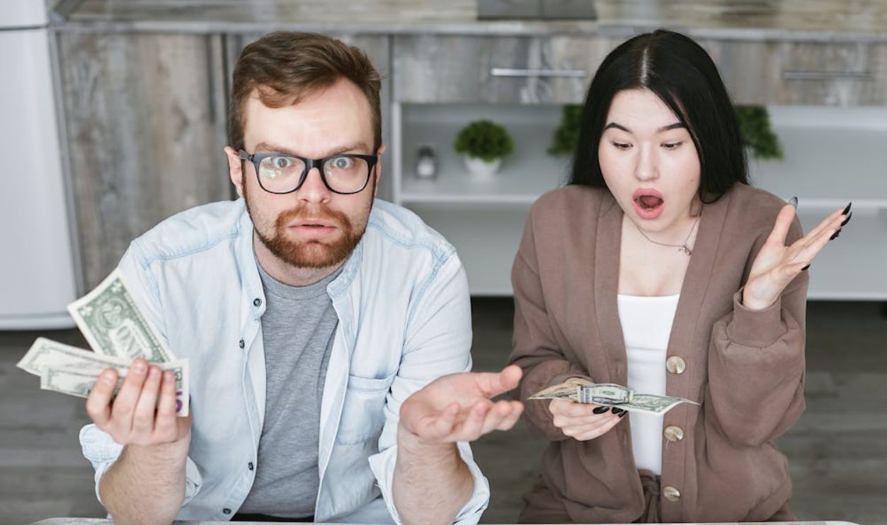 A Couple Sitting at the Table