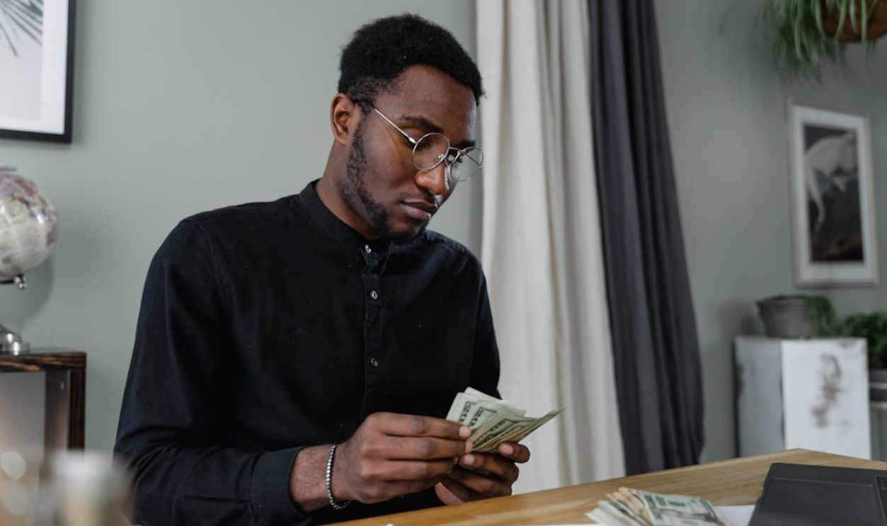 A Man Counting Money