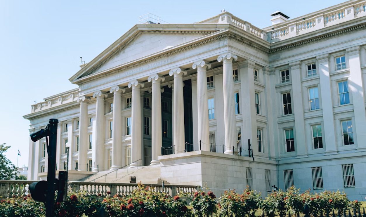 The image shows the united states treasury building.