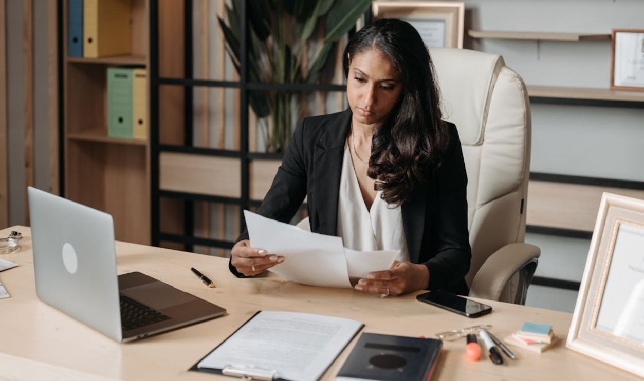 Woman Working at the Desk in Office