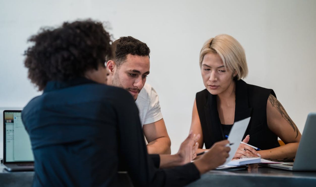 Women and Man on Business Meeting