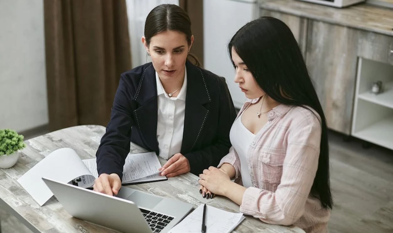 Women Looking at a Laptop Together
