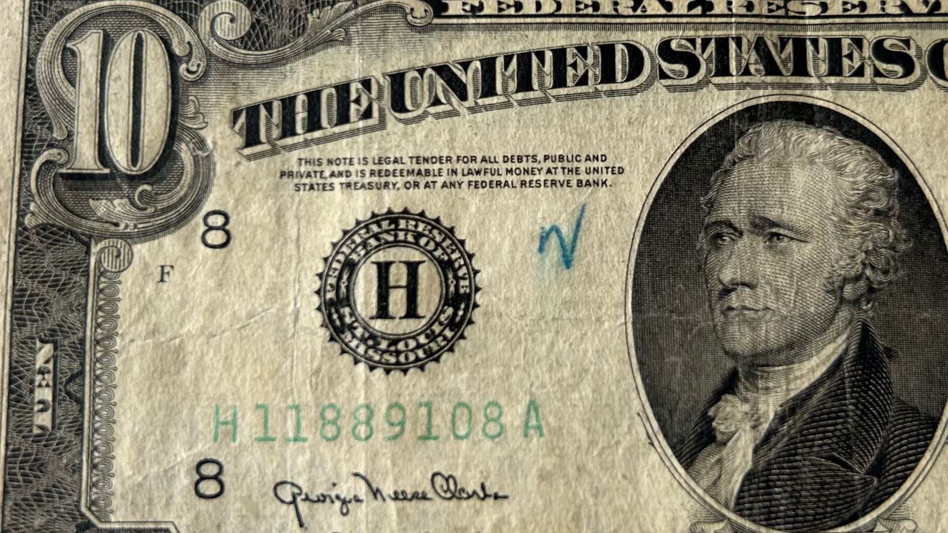 Detail of a Series 1950 United States ten-dollar bill, showing the phrase validating its status as legal tender.
