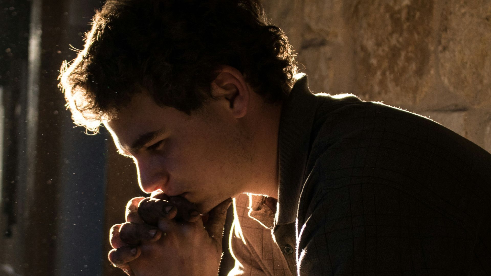 man sitting on bench