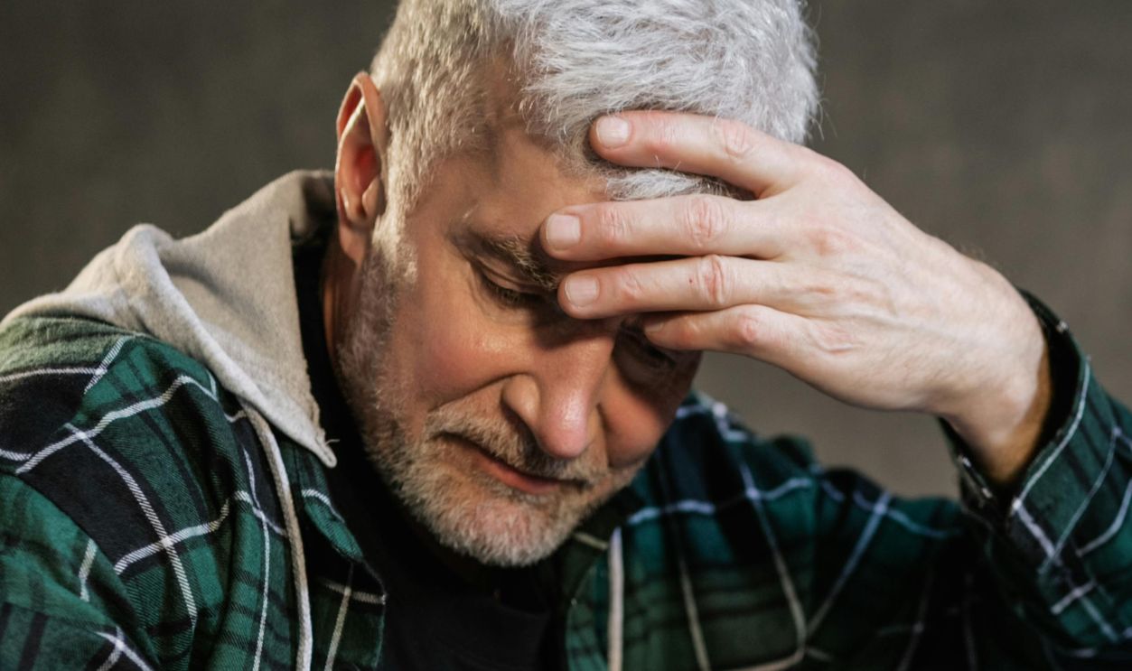 Elderly Man Playing Chess
