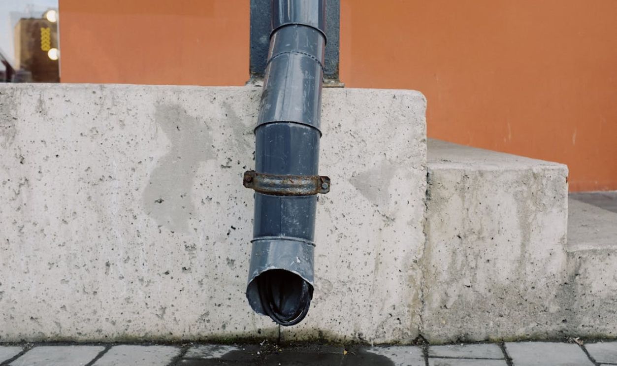 Water Dripping from Drain Spout