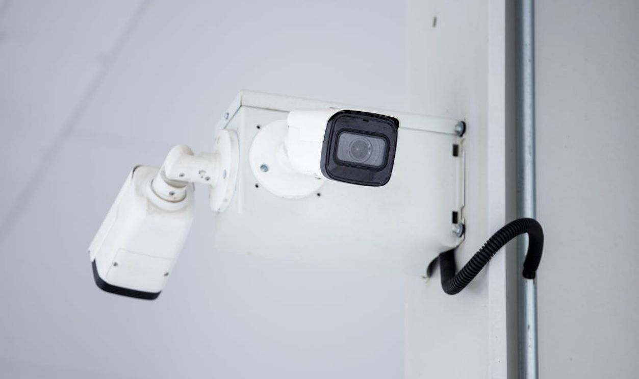 Mounted Surveillance Camera on the Wall