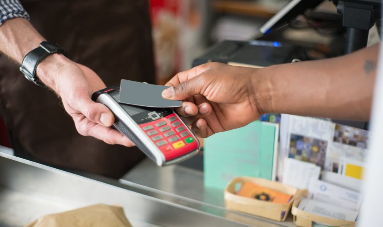 Person Paying Using a Bank Card