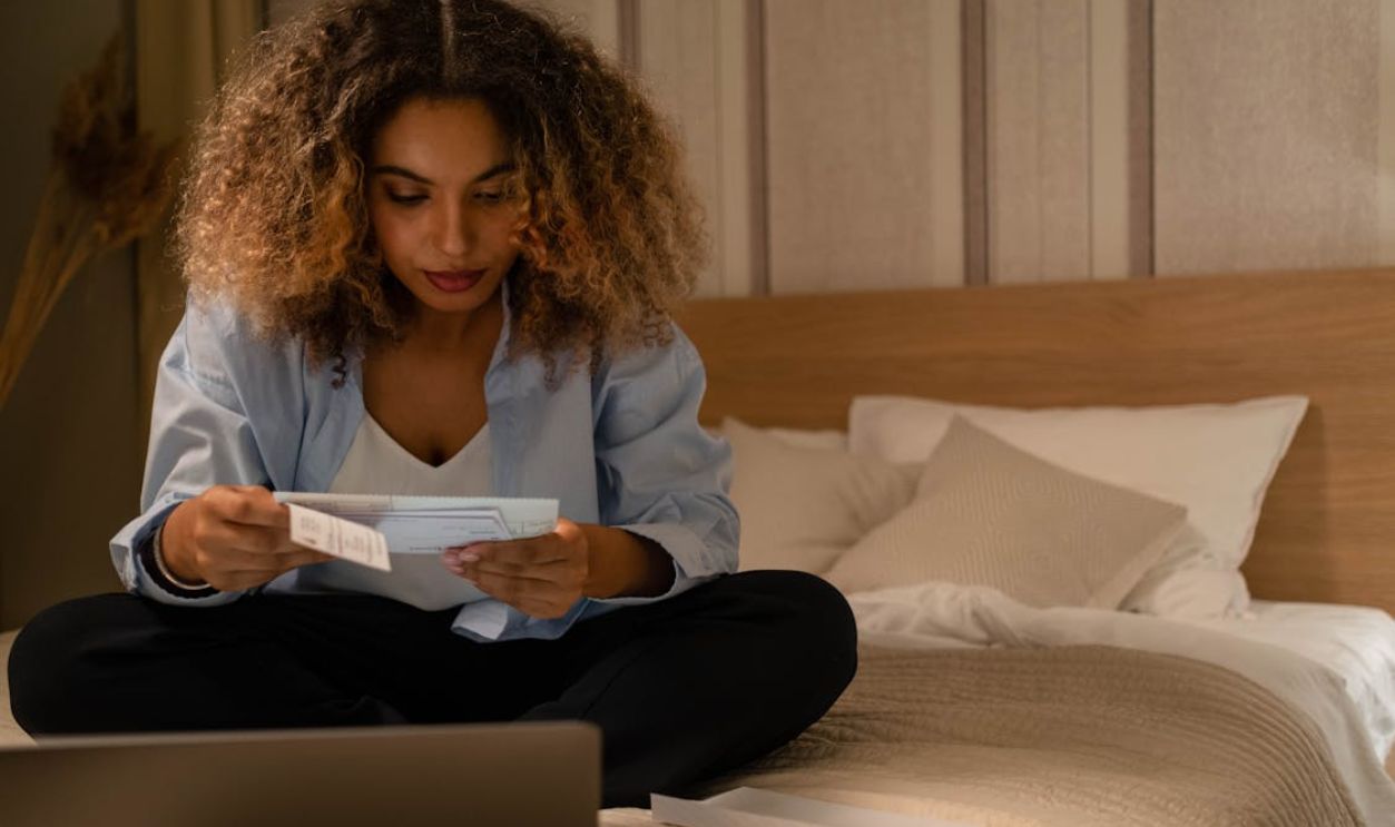 Photo of a Woman Reading a Letter