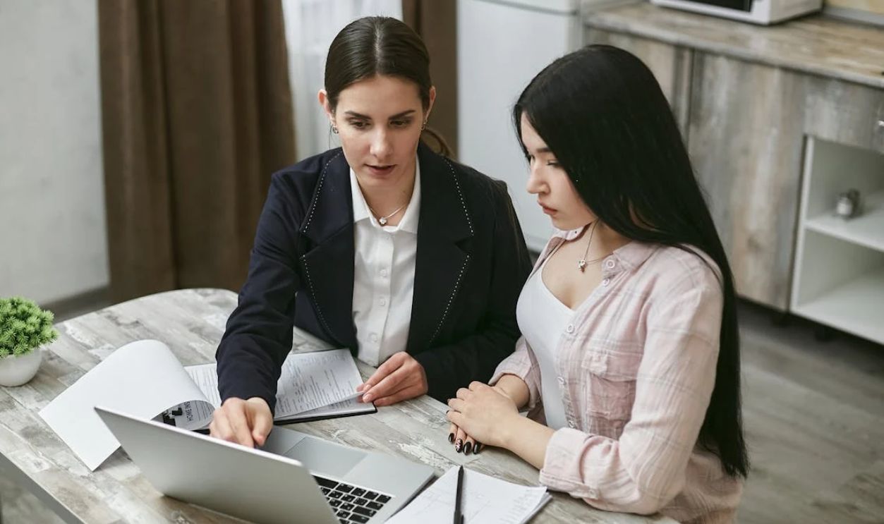 Women Looking at a Laptop Together