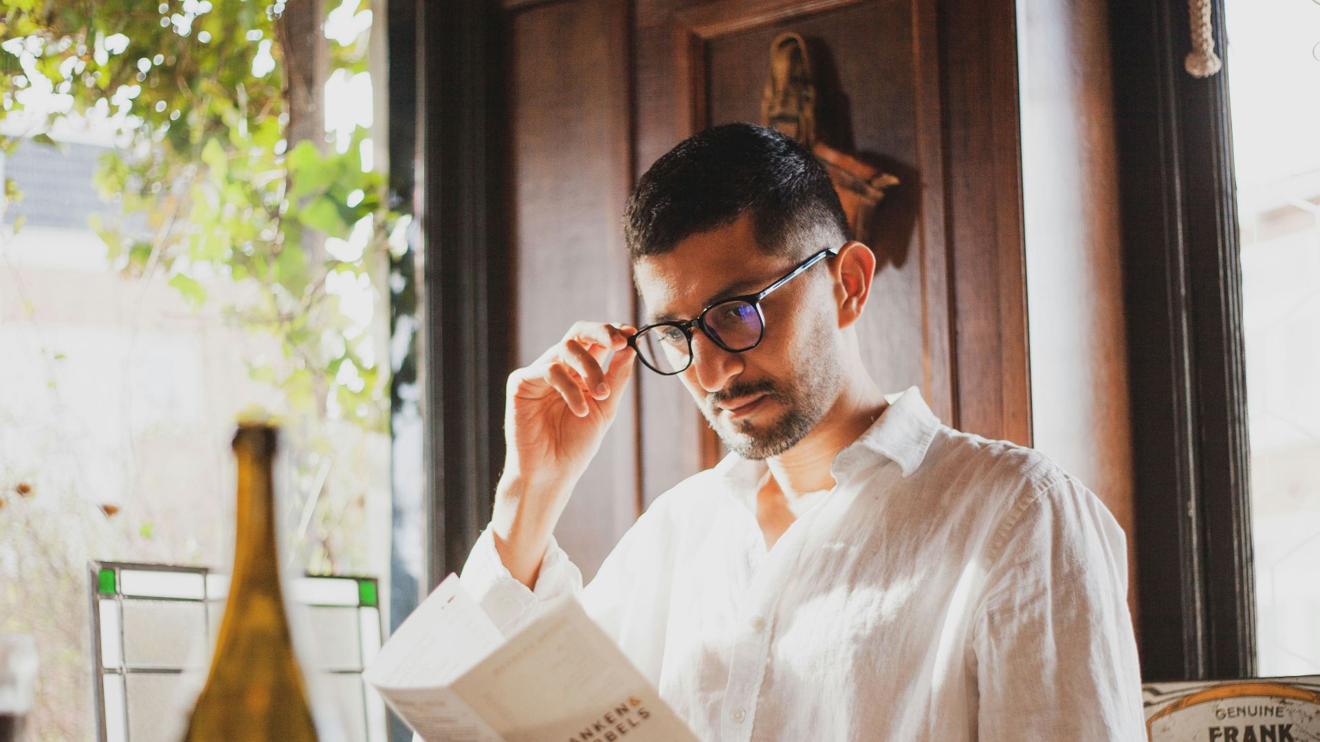 a man reading a newspaper