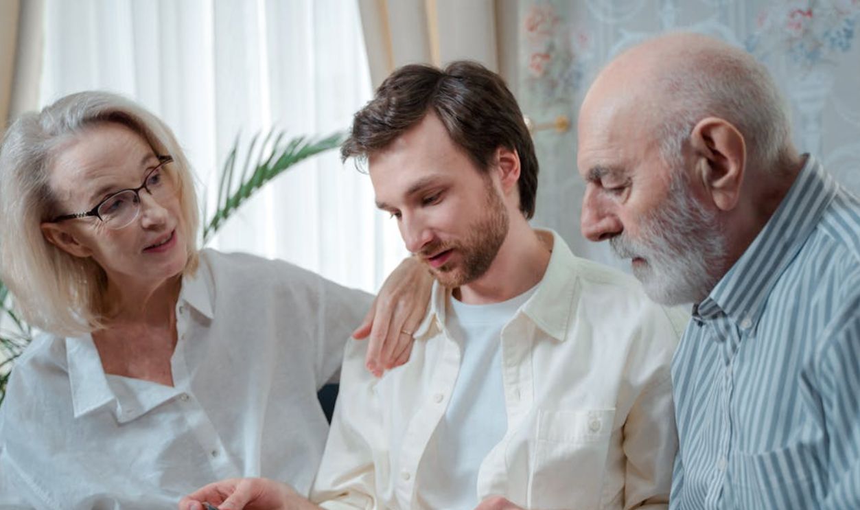 A Family Looking at Pictures