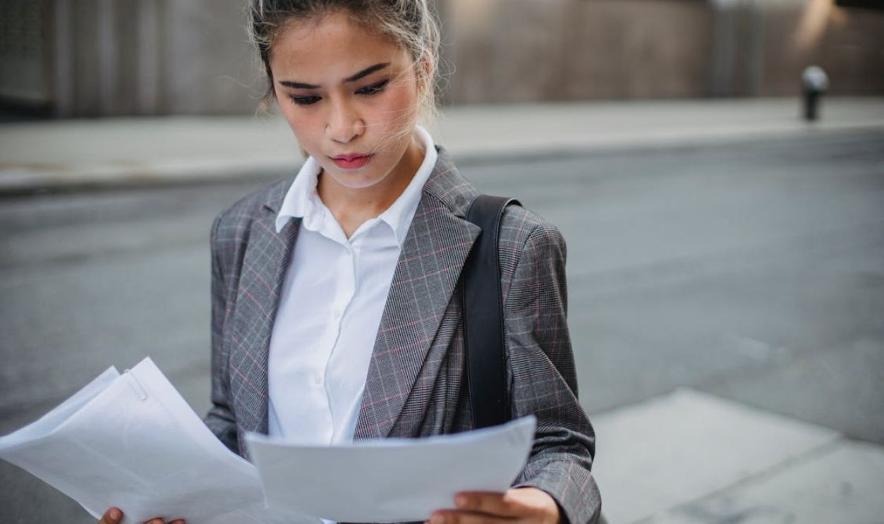 Businesswoman Reading the Documents 